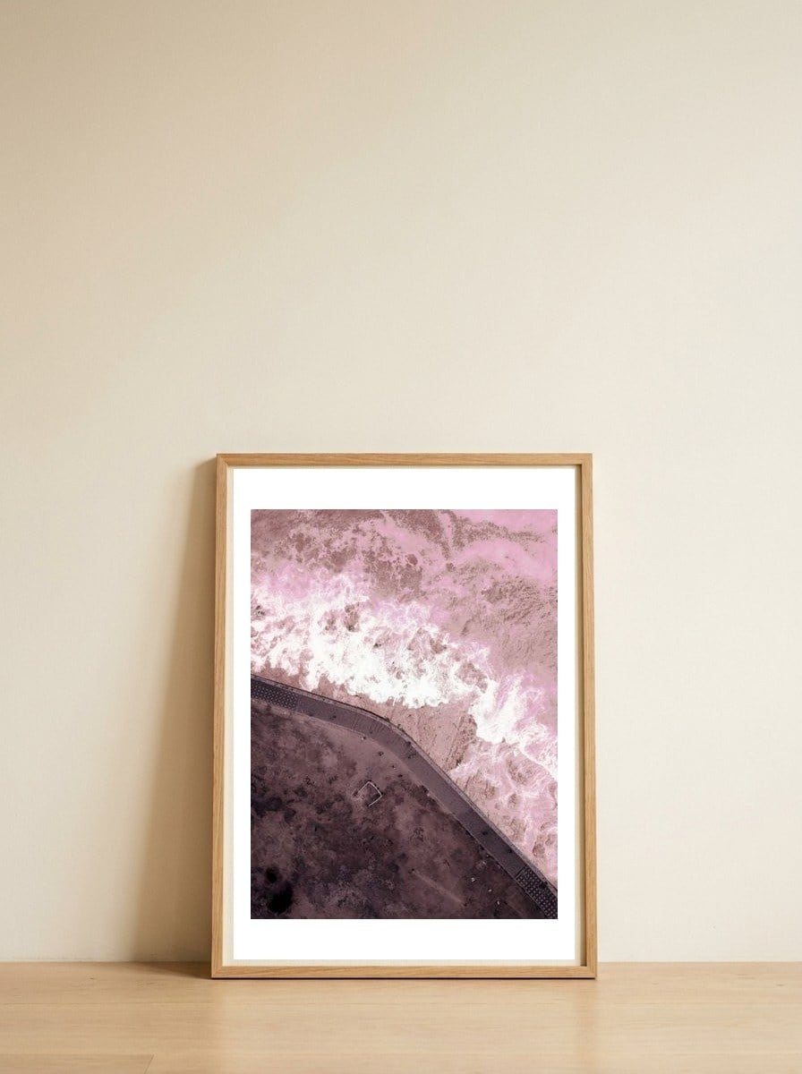 10 — framed, leaning against the wall