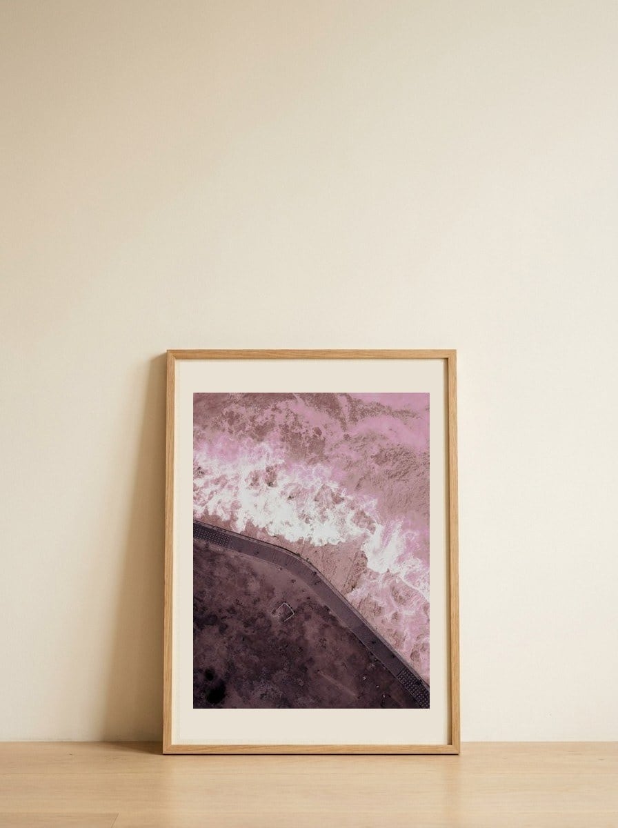10 — framed, leaning against the wall
