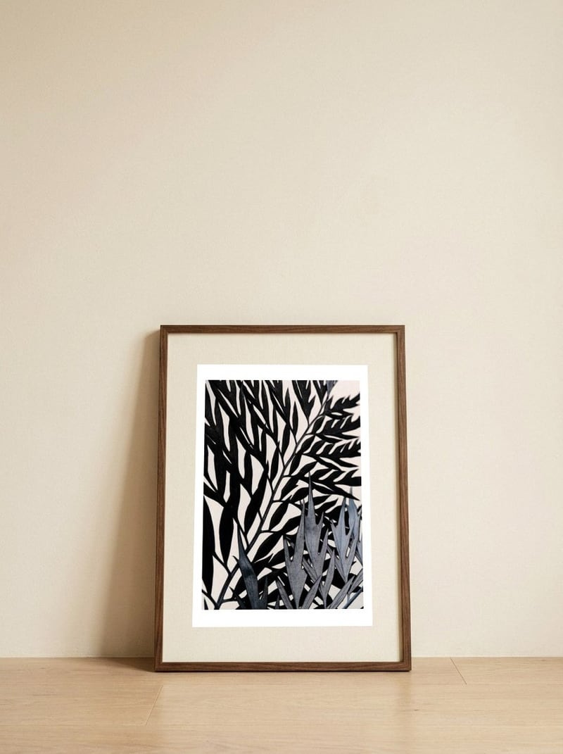 14 — framed, leaning against the wall