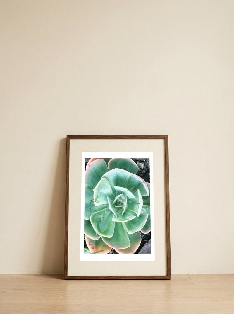 68 — framed, leaning against the wall