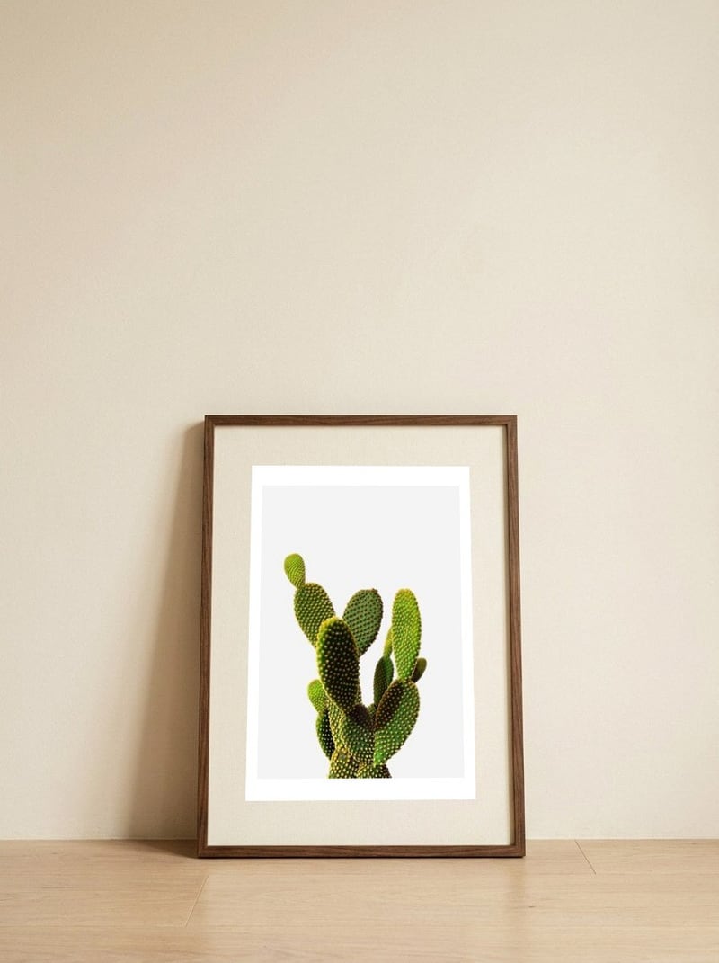 77 — framed, leaning against the wall