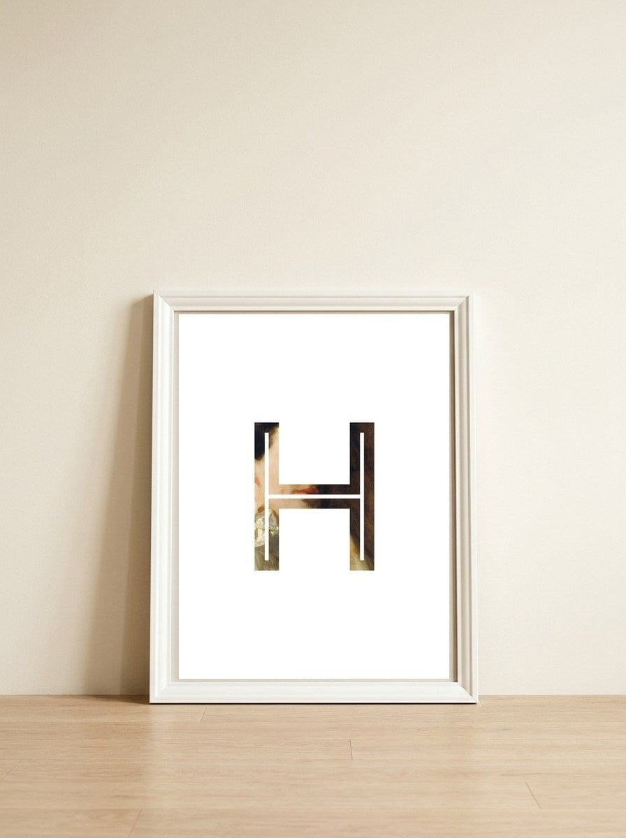 Letter H - (Impress) — framed, leaning against the wall