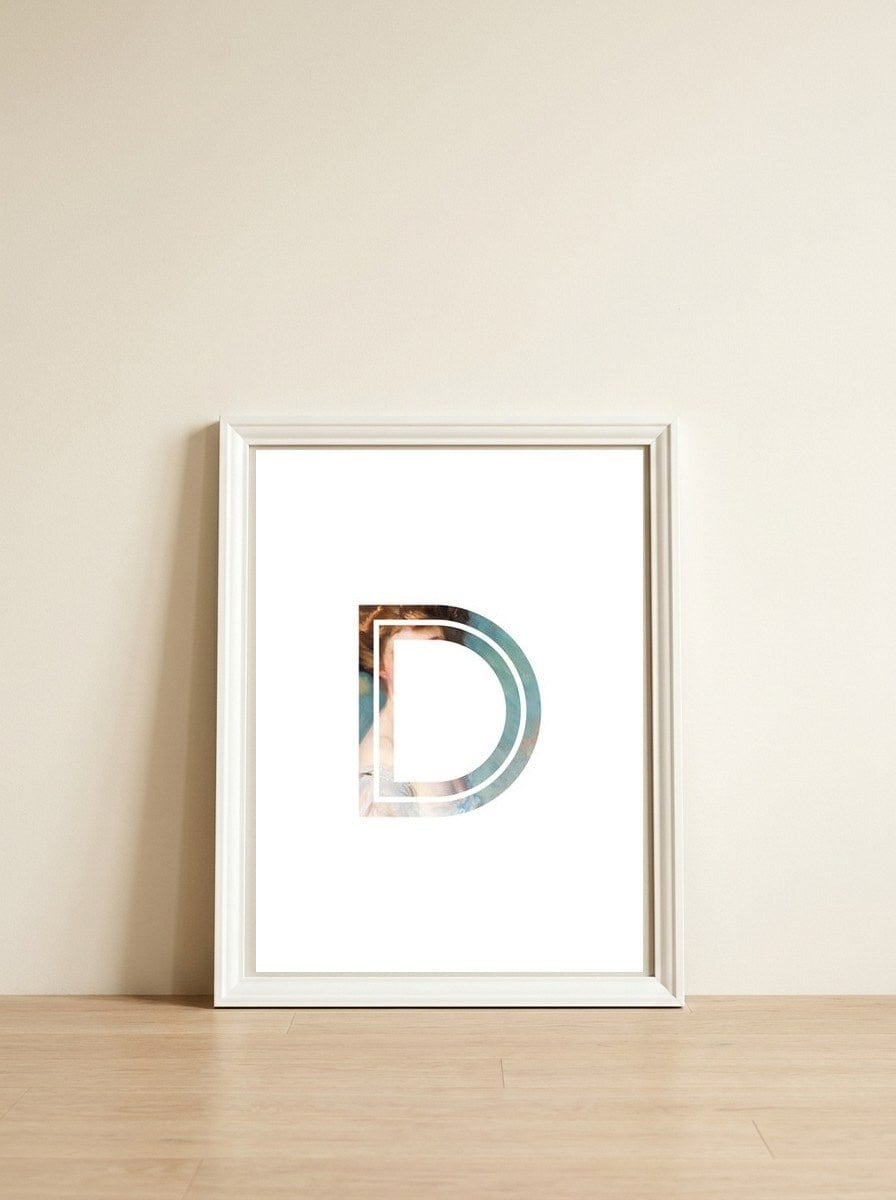 Letter D - (Impress) — framed, leaning against the wall