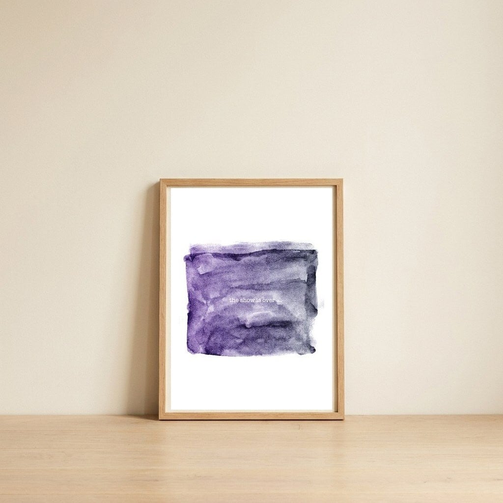 The show is over — framed, leaning against the wall