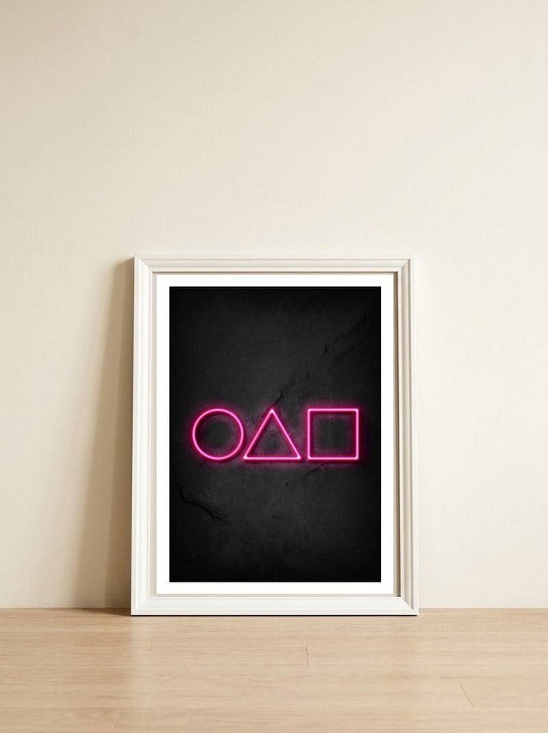 Squid Game Logo — framed, leaning against the wall