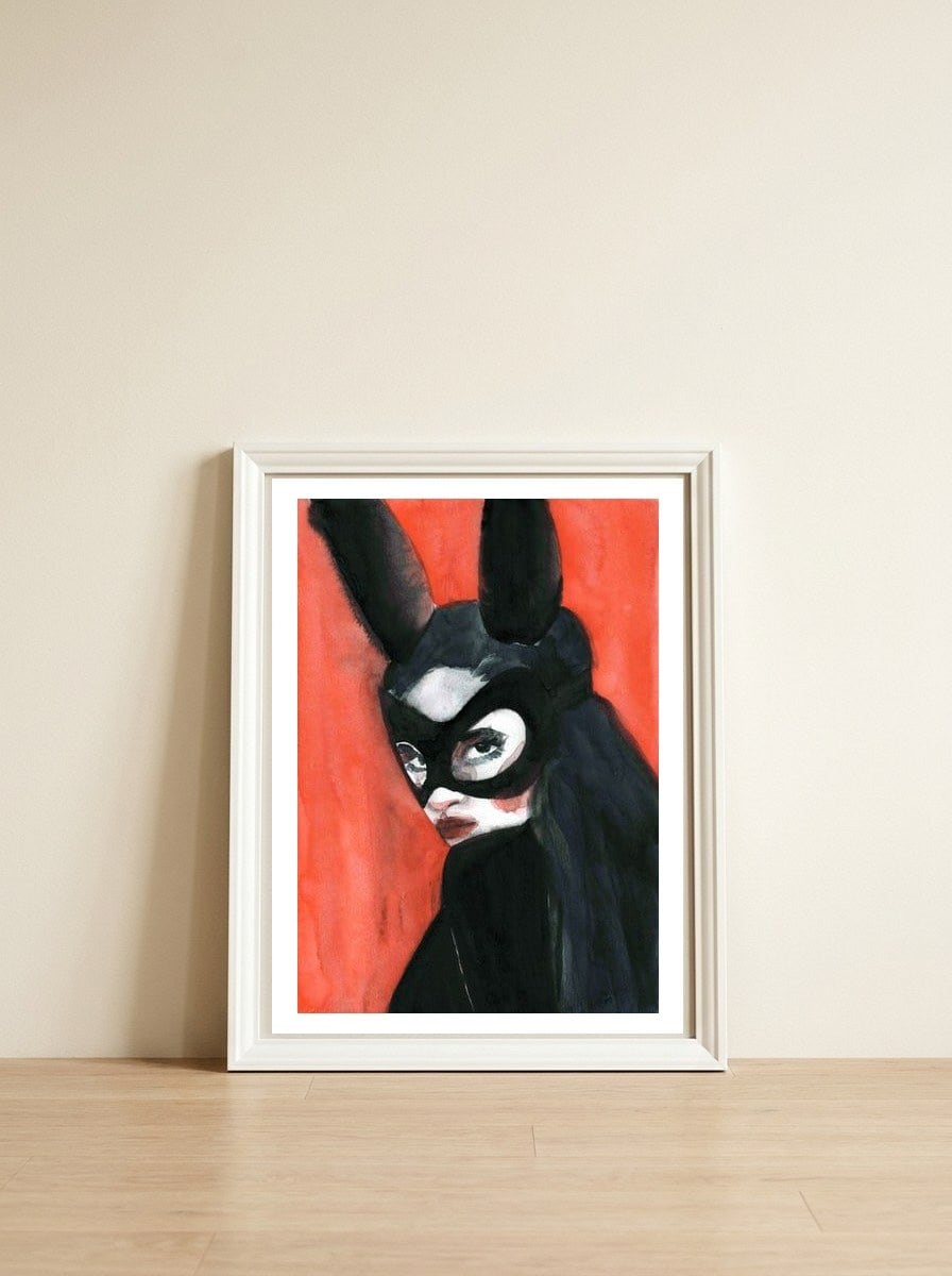 Orange Bunny — framed, leaning against the wall