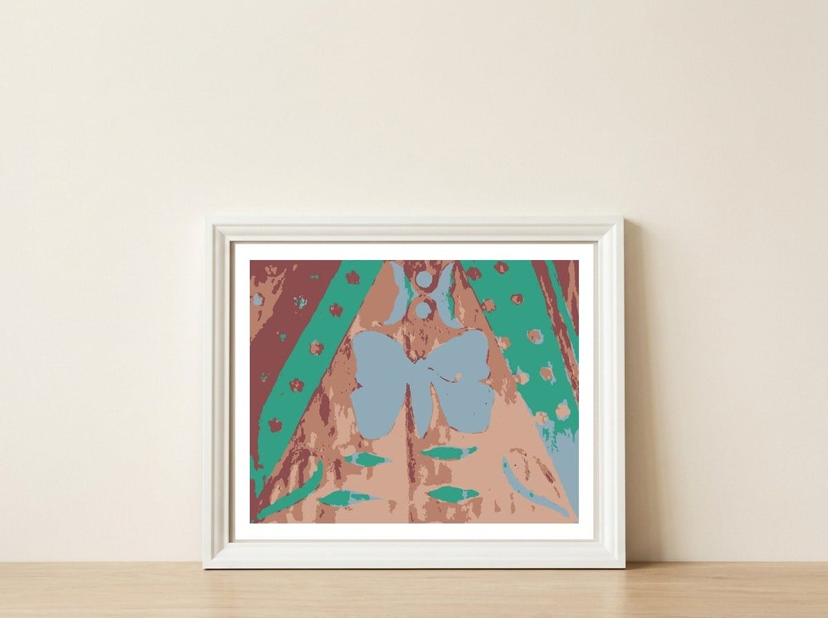 Butterfly Flower Array Art — framed, leaning against the wall