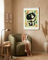 Cat A Tonic Tuxie framed in a tender room thumbnail