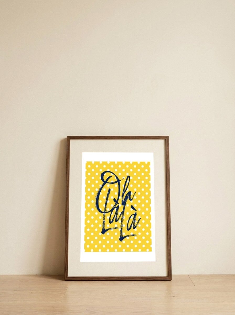 Oh La La — framed, leaning against the wall