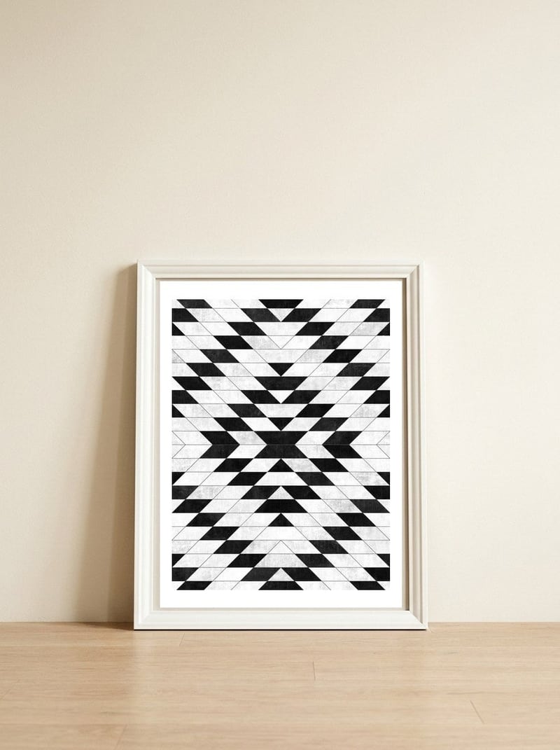 Urban Tribal Pattern No.15 - Aztec - White Concrete — framed, leaning against the wall