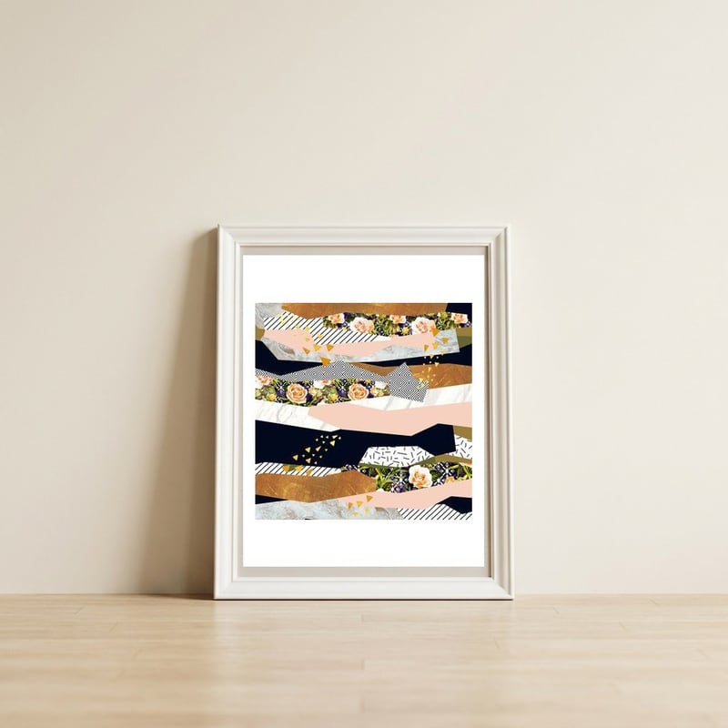 Collage of textured shapes and flowers — framed, leaning against the wall
