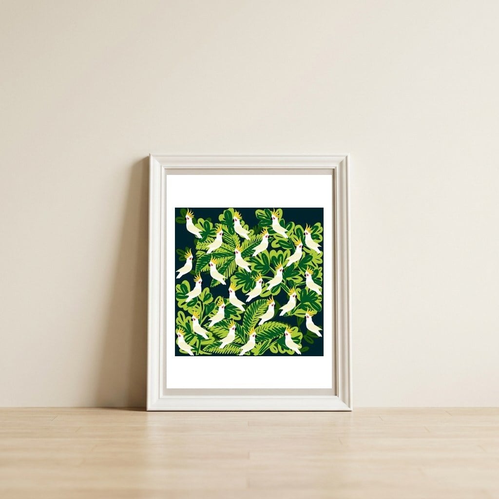 Cute cockatoo and tropical leaves — framed, leaning against the wall