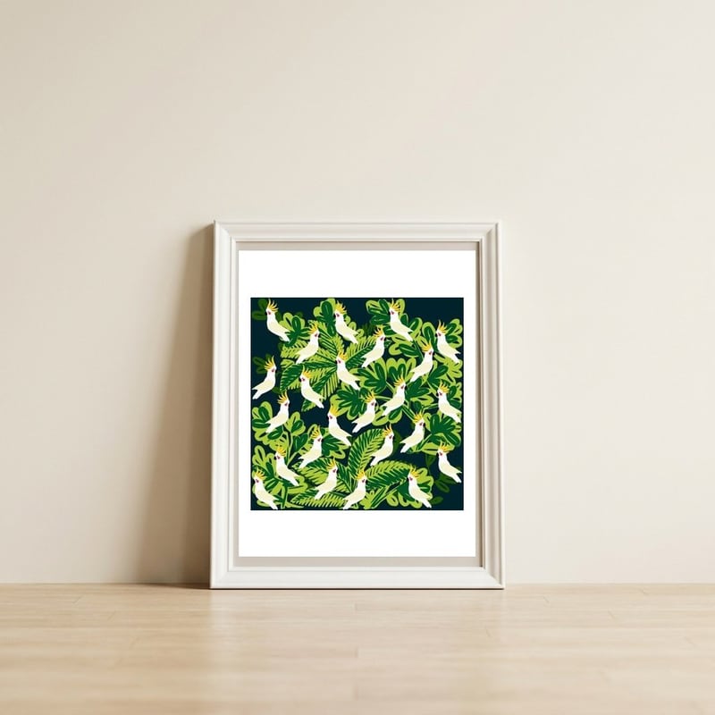 Cute cockatoo and tropical leaves — framed, leaning against the wall