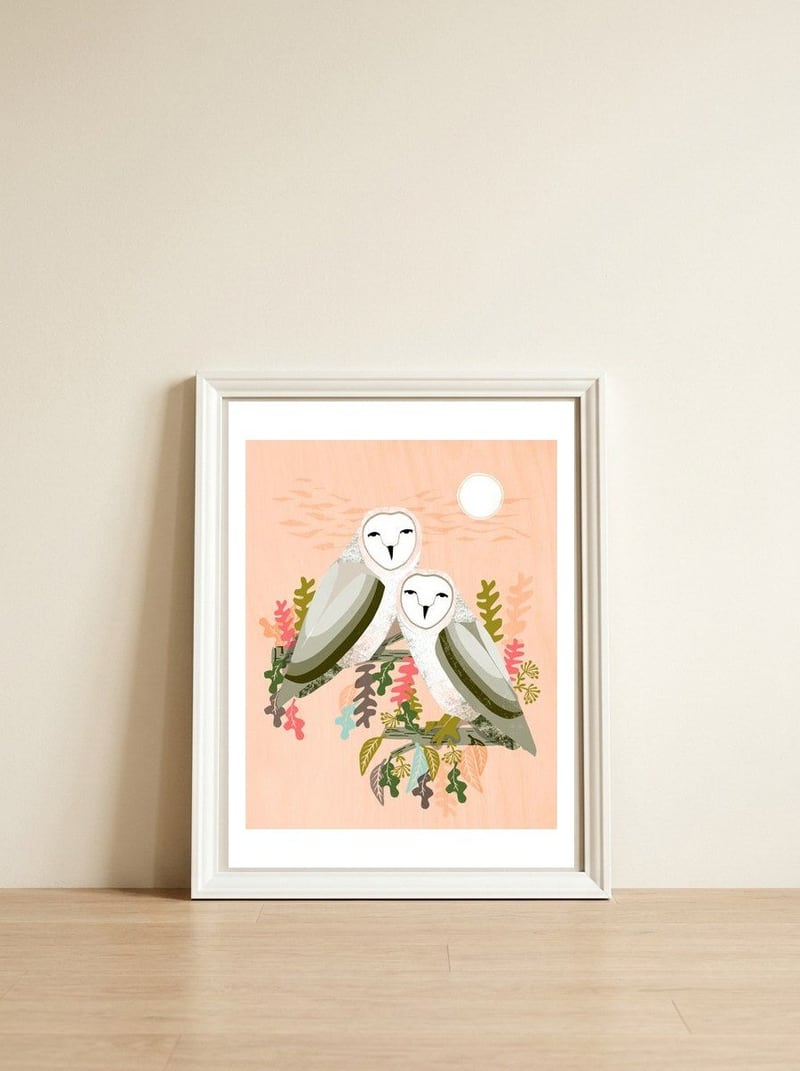 Owls — framed, leaning against the wall