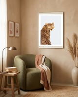 Cool Cat Cheetah Portrait with Gold Sunglasses framed in a tender room thumbnail