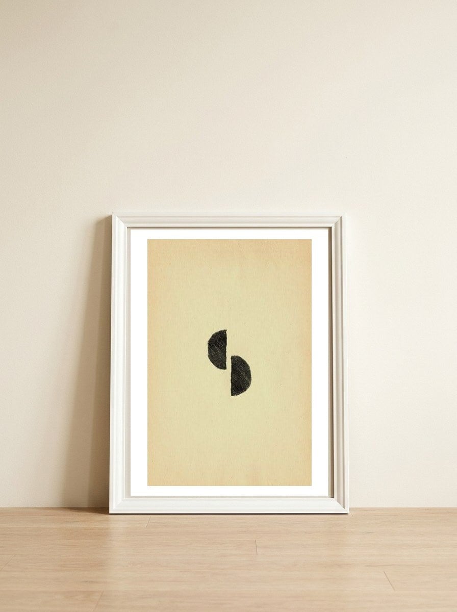 Abstract mid-century modern shapes — framed, leaning against the wall