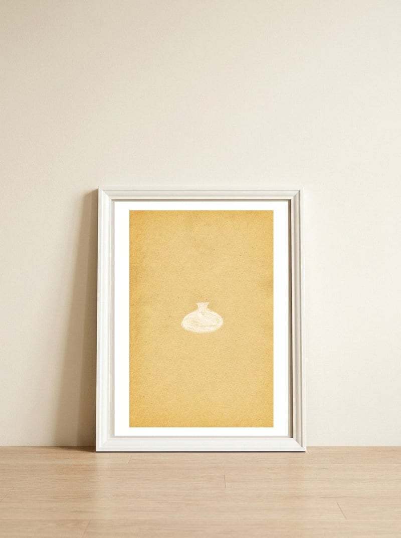 Minimalist vase and vintage paper — framed, leaning against the wall