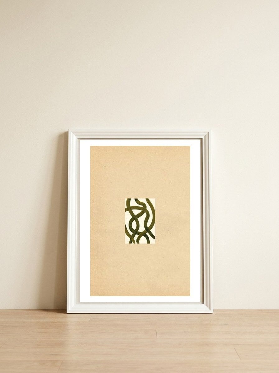 Vintage paper art — framed, leaning against the wall