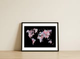 Wanderlust (Black) — framed, leaning against the wall thumbnail