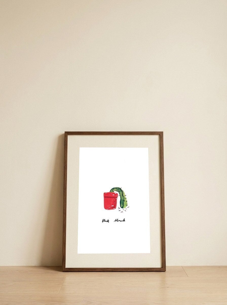 Black Thumb — framed, leaning against the wall