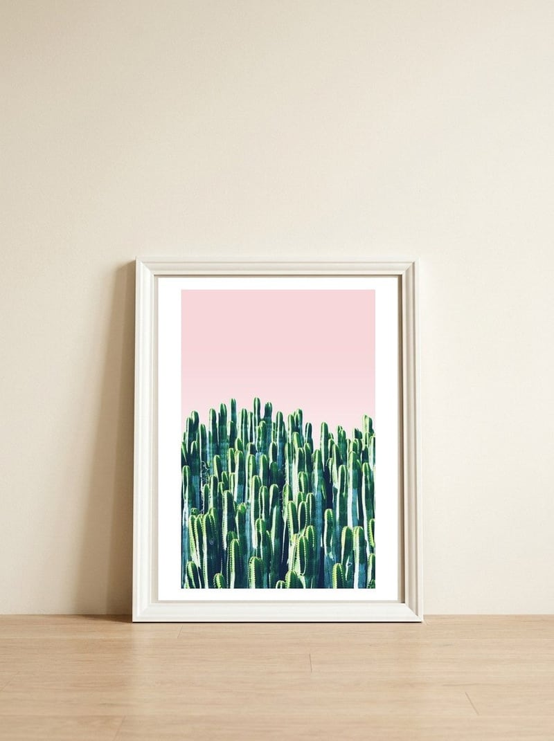 Cactus & Sunset II — framed, leaning against the wall
