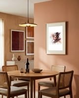 side-view-asian-warrior-woman-portrait-1 framed in a intimate room thumbnail