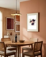 classic-beige-hat-portrait framed in a intimate room thumbnail