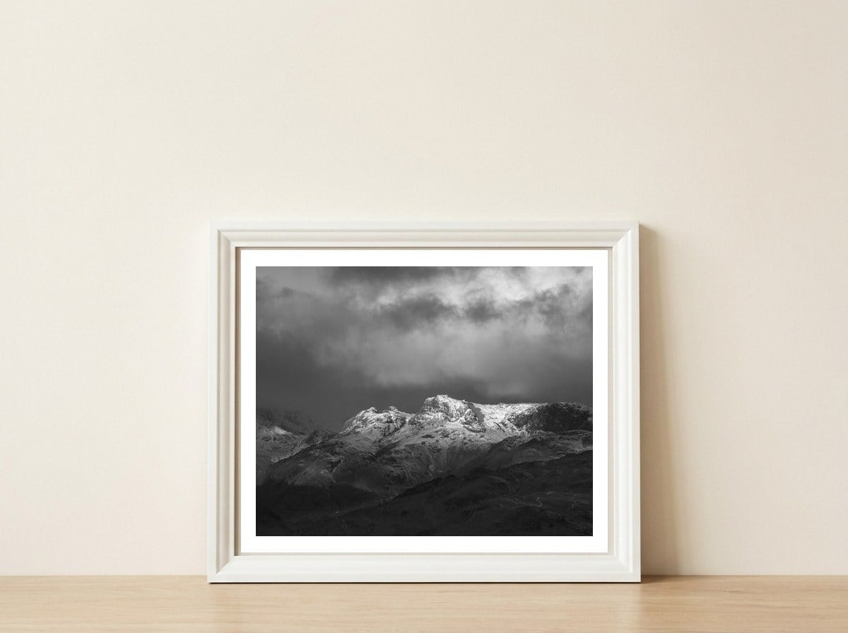 The Langdale pikes — framed, leaning against the wall