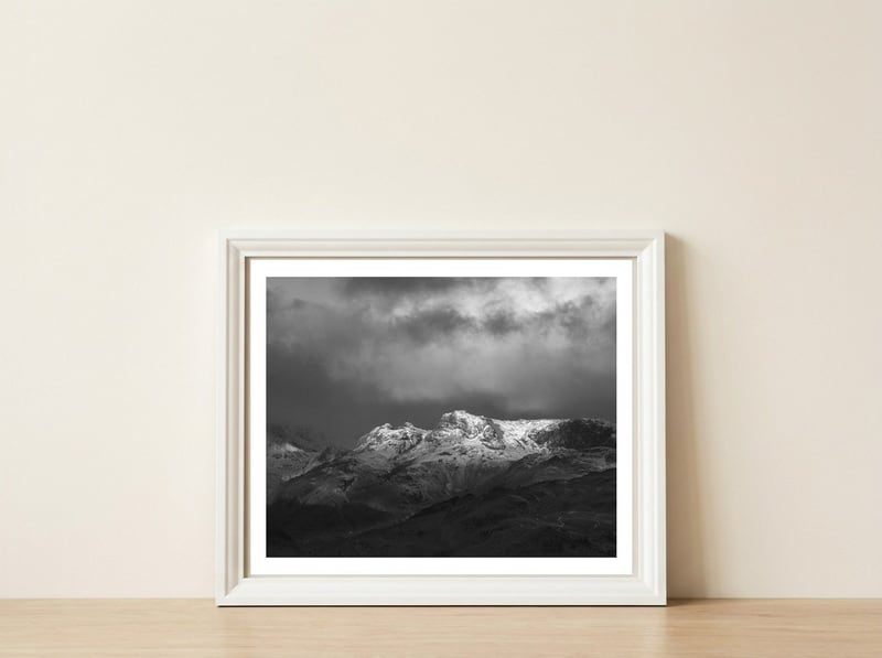 The Langdale pikes — framed, leaning against the wall