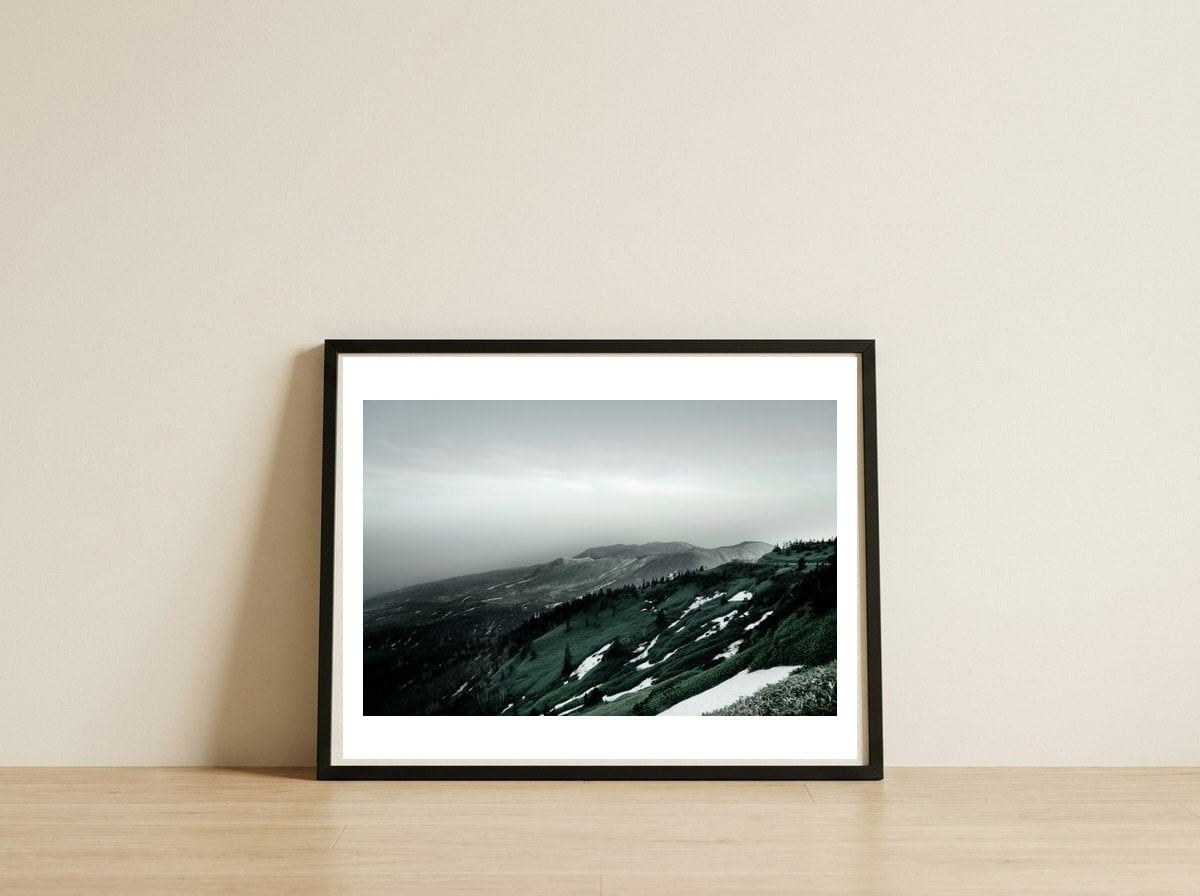 remaining-snow-mountain — framed, leaning against the wall