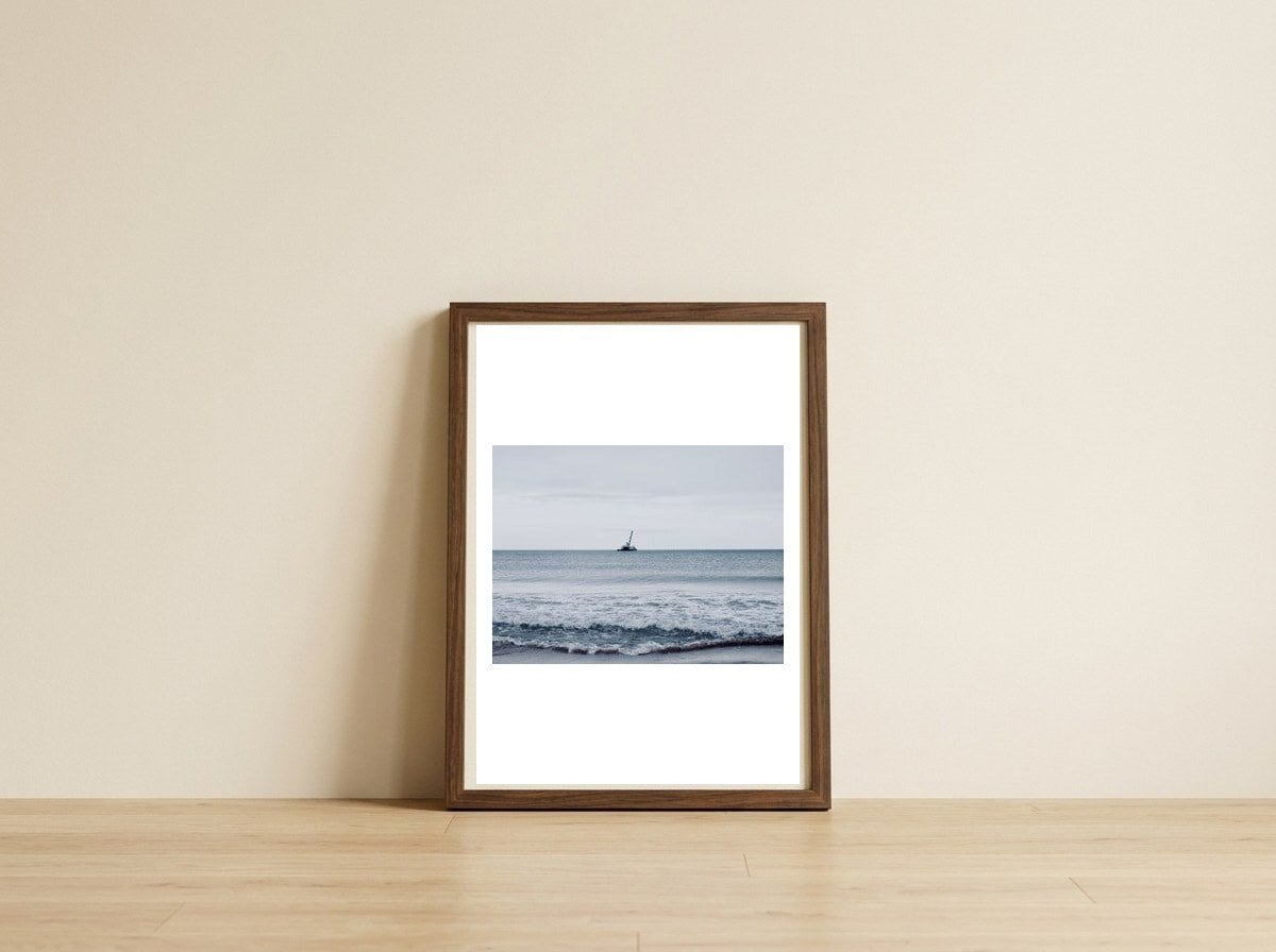crane-tower-on-the-ocean — framed, leaning against the wall