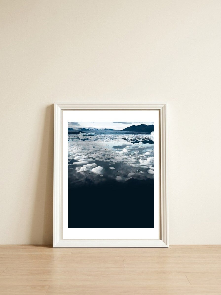 Entice — framed, leaning against the wall