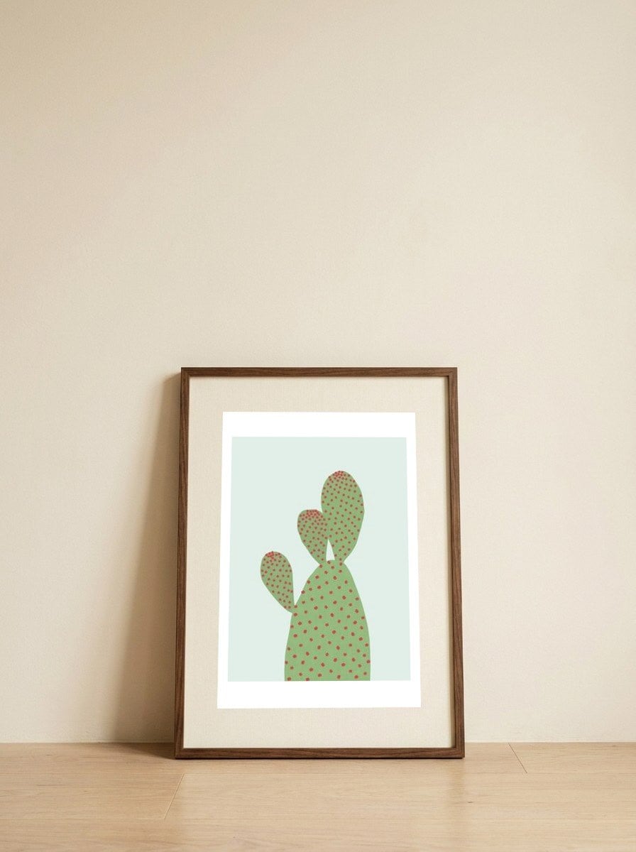 Watercolor of cacti I — framed, leaning against the wall