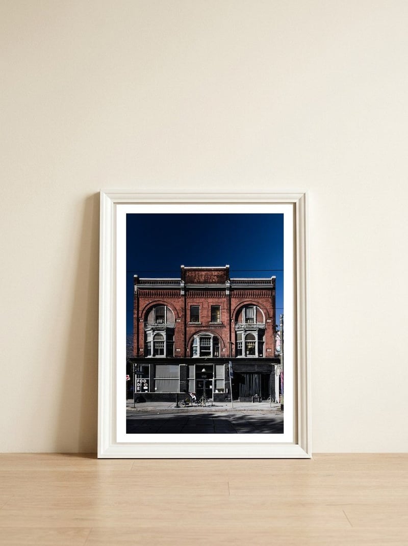 Joseph White Building No 7 Color Version — framed, leaning against the wall