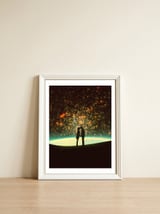 A Cosmic Kiss — framed, leaning against the wall thumbnail