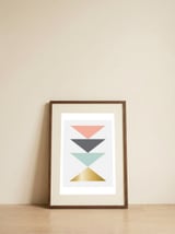 Four triangles — framed, leaning against the wall thumbnail