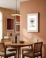 Four triangles framed in a intimate room thumbnail