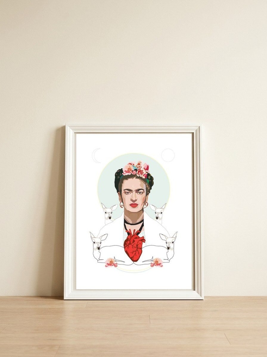 Frida Kahlo (light) — framed, leaning against the wall
