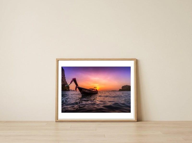 Longtail Sunset — framed, leaning against the wall