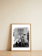 OLIVER HARDY and STAN LAUREL in PACK UP YOUR TROUBLES (1932), directed by GEORGE MARSHALL. — framed, leaning against the wall thumbnail