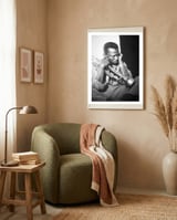 Jazz trumpeter Miles Davis early in his career playing in New York City, circa 1955. framed in a tender room thumbnail