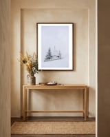 The white church on the snowy mountain framed in a welcoming room thumbnail