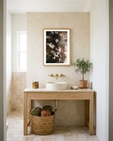 Pink flowers in the shadow framed in a breezy room thumbnail
