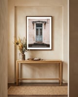 Vintage blue door framed in a welcoming room thumbnail