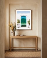 The door of Ostuni framed in a welcoming room thumbnail