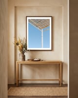 Hiding from the sun framed in a welcoming room thumbnail