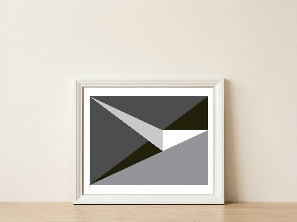 Geometric Shapes No. 73 - black & grey triangles  — framed, leaning against the wall