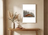 Wooden shed with snow framed in a welcoming room thumbnail