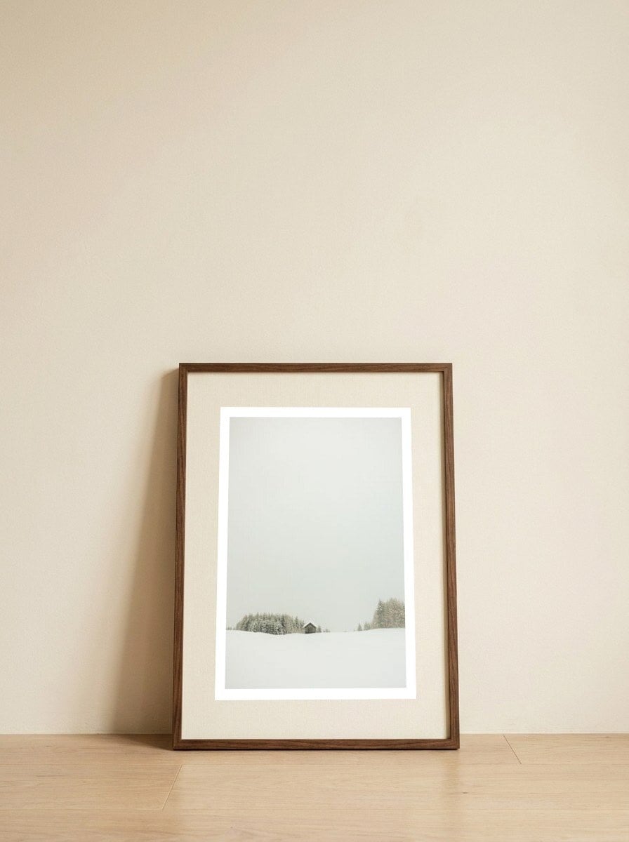 Minimalistic snow landscape — framed, leaning against the wall
