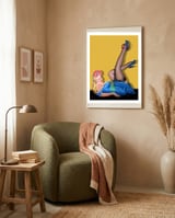 Sexy Pinup Winking Girl In Showing Her New High Heels framed in a tender room thumbnail